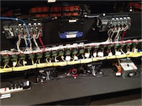 Close up of control board showing PLC controllers and stepper motor drivers