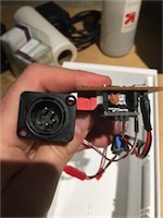 View of the side of the perf board, showing the DMX chips tucked underneath the Arduino